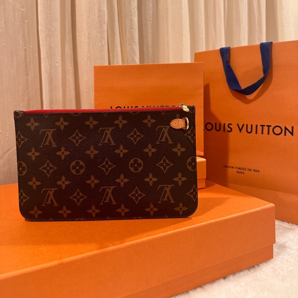 Louis Vuitton Handbags - 💯% Authentic Louis Vuitton Neverfull Wristlet✨
